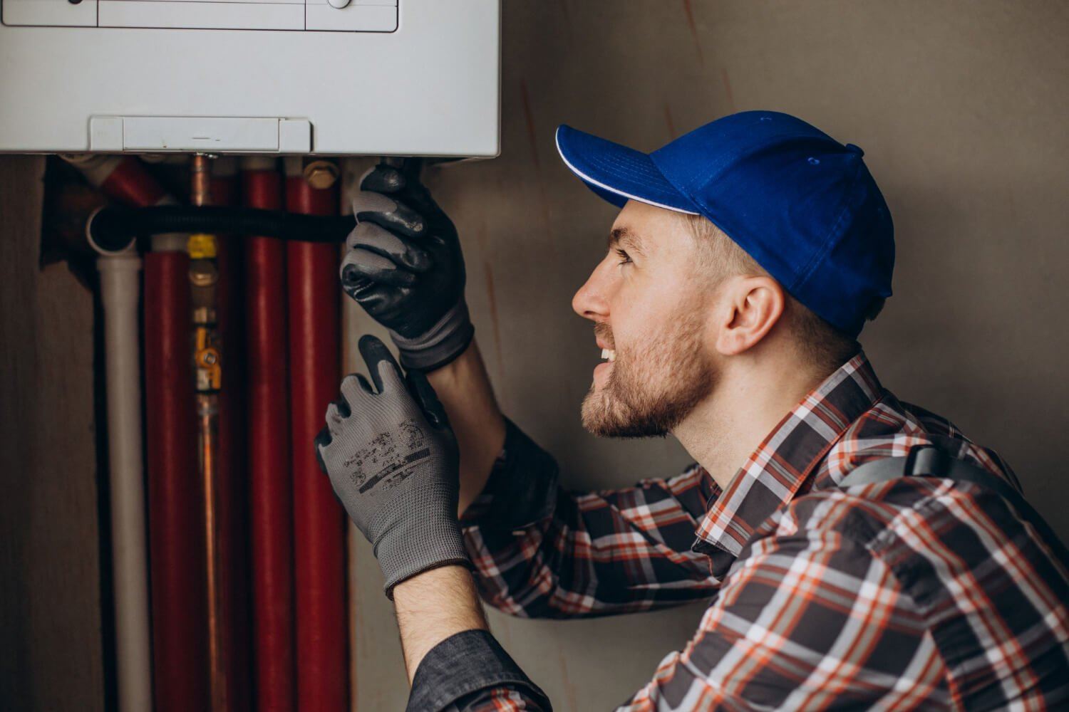 Man fixing the heater