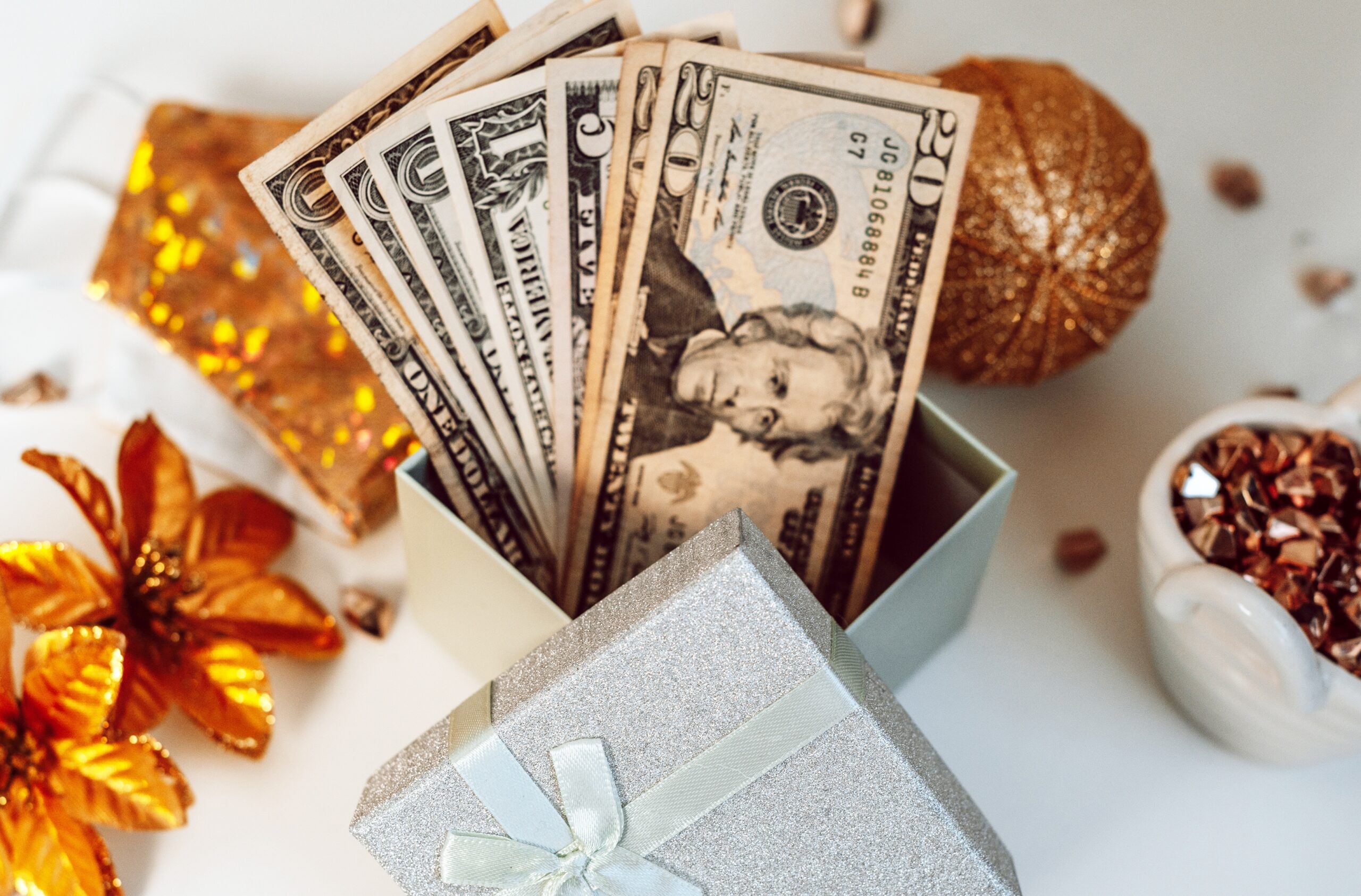 holiday table setting with money